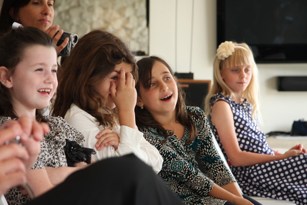 children girls smiling during music recital